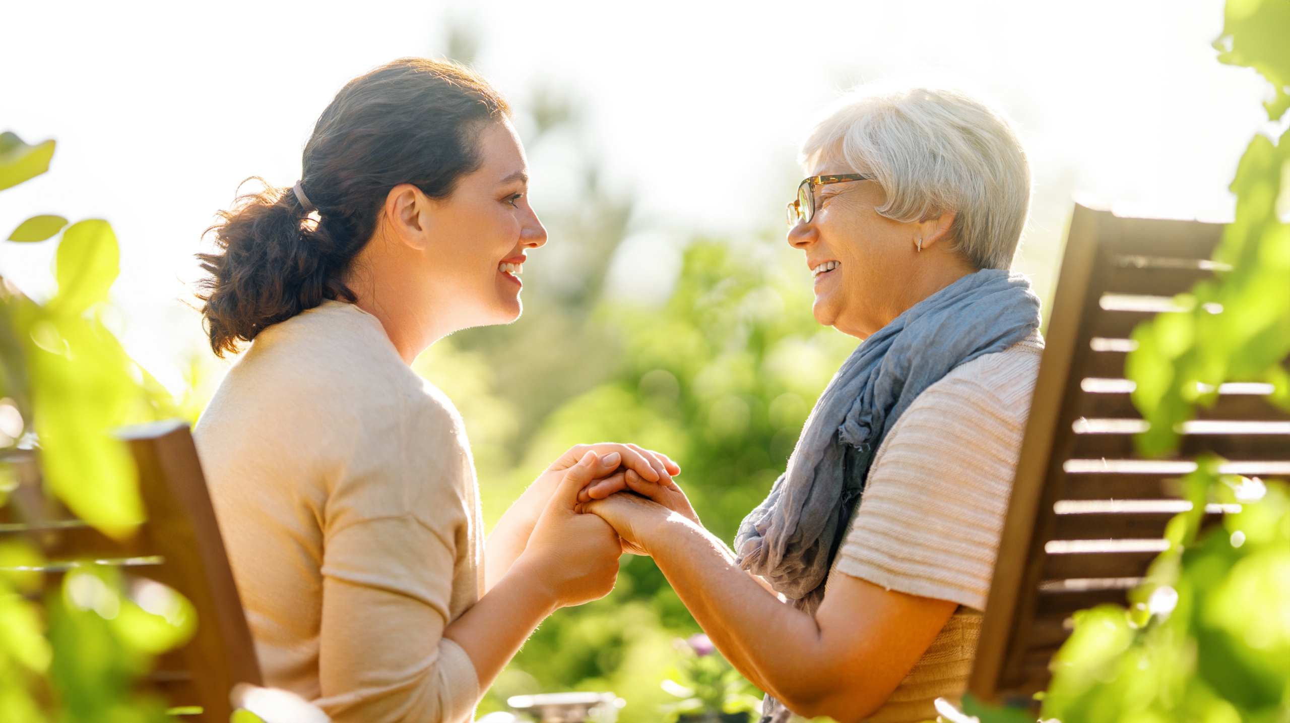 Senior Conversing with Caregiver