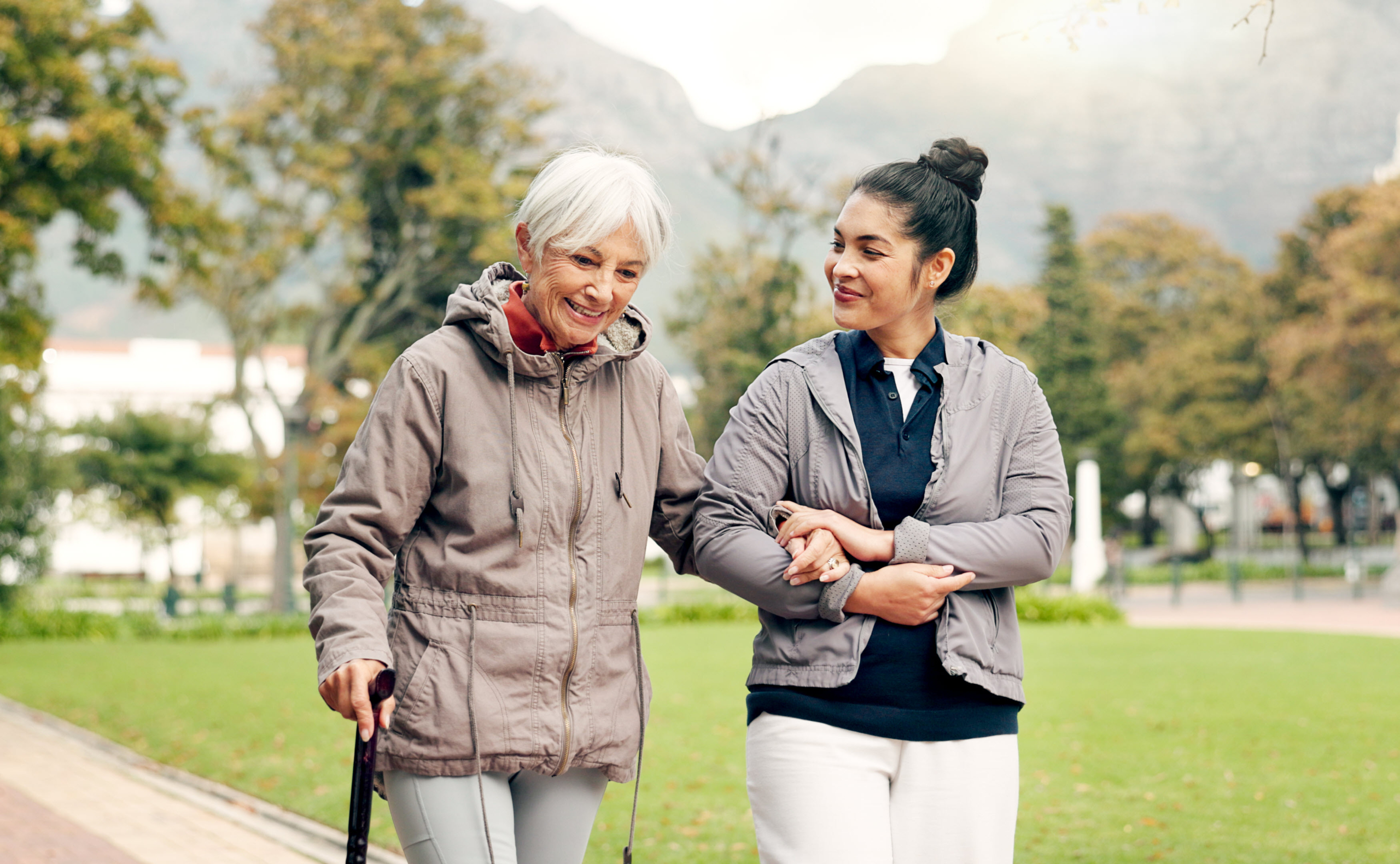 Senior Walking with Caregiver